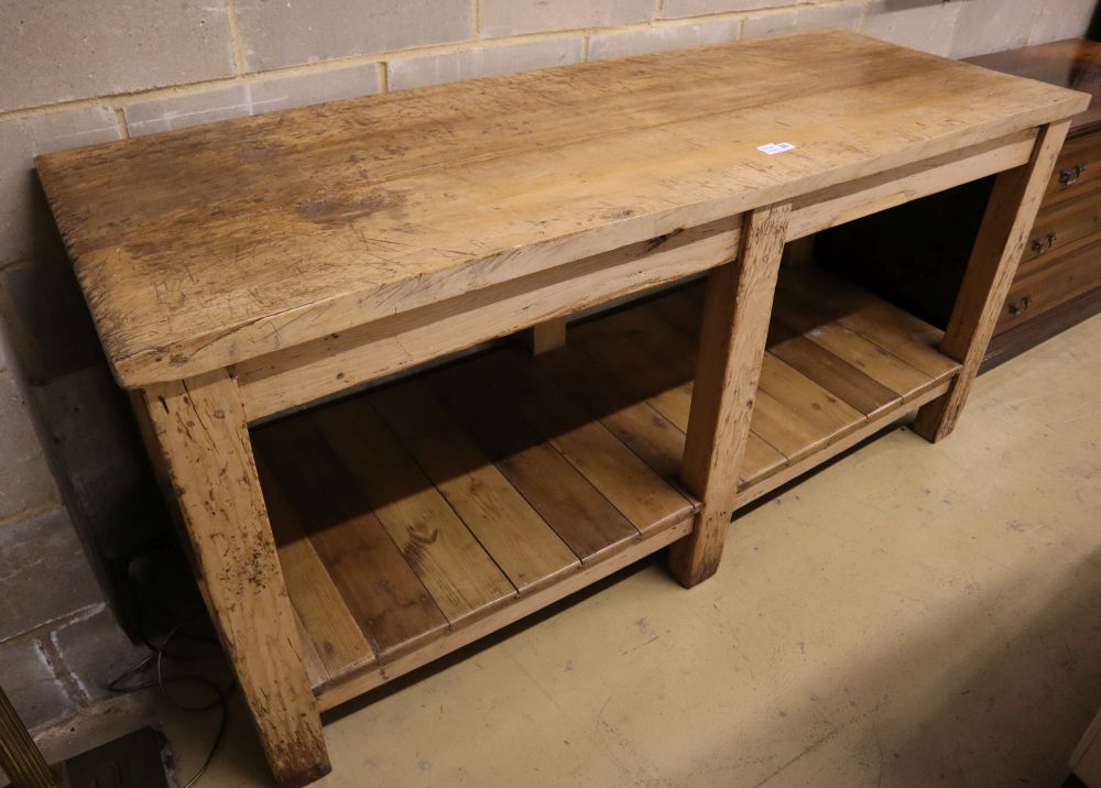 A Victorian beech and pine two tier kitchen table, width 183cm depth 65cm height 87cm